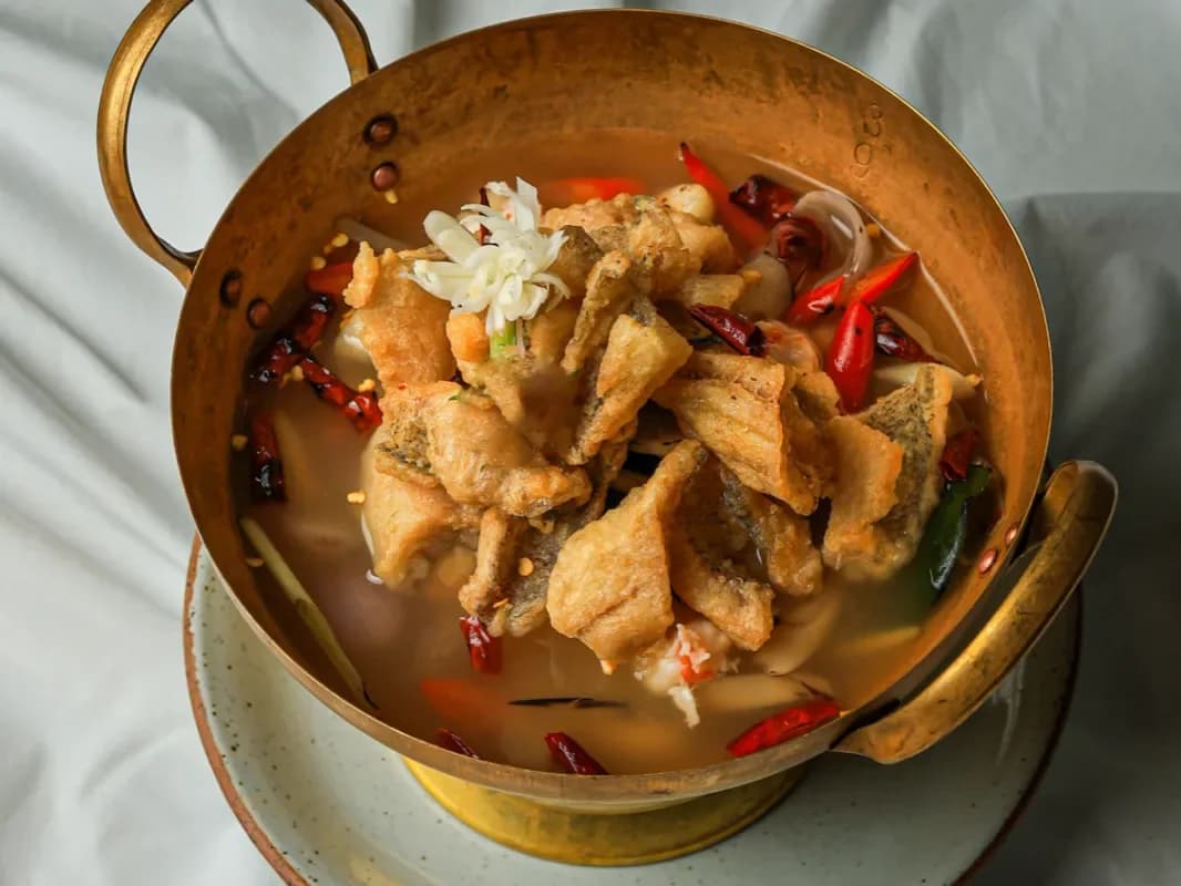 Sour and Spicy Smoked Dry Gourami Fish Soup
